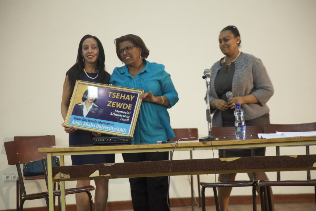 Haben and Aster posing with award at Addis University