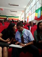 Haben speaks with Dr. Kindaye using her keyboard and braille display.
