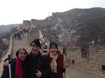 Haben, Shuang, Tai pose on great wall with wall winding in background