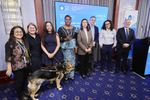 Speakers stand together in front of a blue screen that says &ldquo;World Health Summit, October 13-15, 2024, Berlin, Germany & Digital.&rdquo; From left to right we have: R. Vensya Sitohang, Natasha Smith, Haben Girma, Hellen Anurika Beyioku-Alase, Mar&iacute;a Jos&eacute; Plaza, Jarrod Clyne, Rachel Veldkamp, J&eacute;r&ocirc;me Salomon. Haben's seeing eye dog Mylo is standing in front of her wearing his harness and looking alert, and a podium sits on the far-right side.