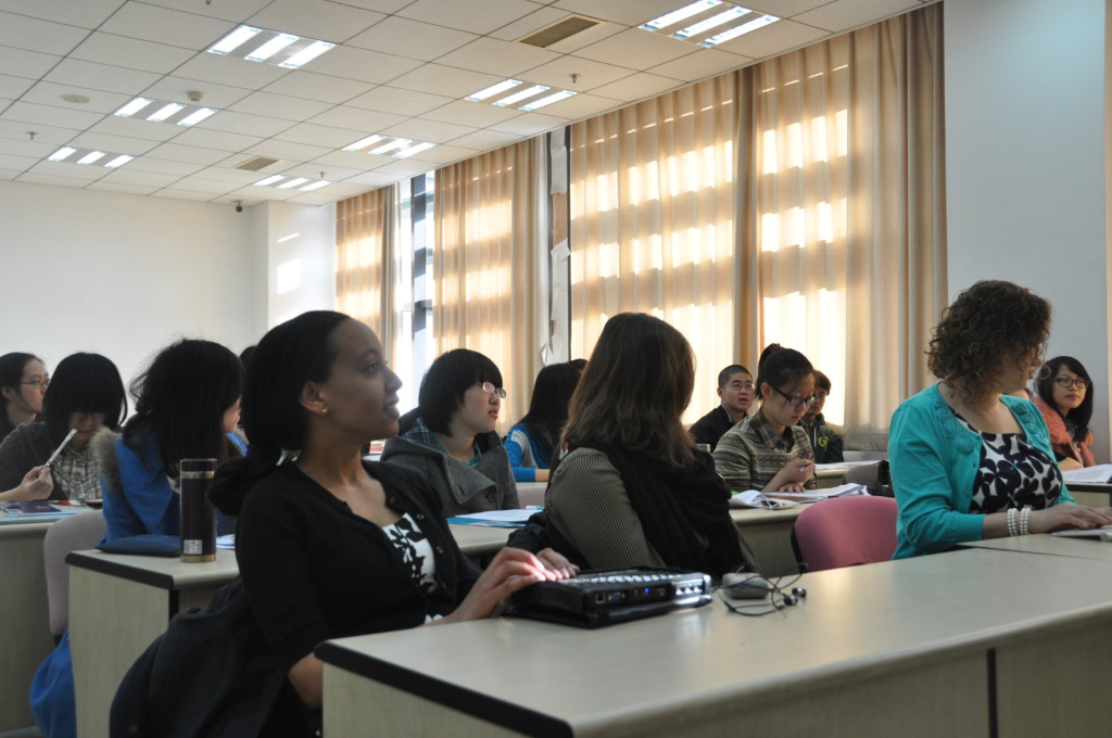 Haben and Tai sit in classroom at Renmin University School of Law