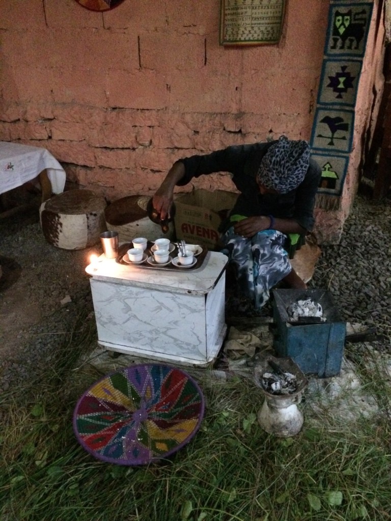 A woman prepares traditional Ethiopian coffee in Mekele.