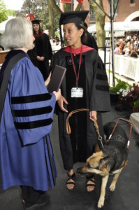 Harvard Law School Dean Martha Minow hands Haben her diploma