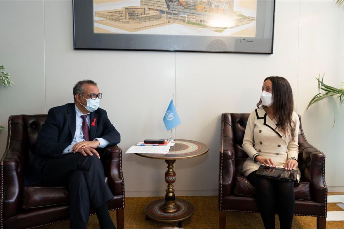 WHO Director-General Dr. Tedros and I are discussing the report in his office. We’re sitting in armchairs, both wearing face masks, and my braille computer is in my lap. The small round table between us has the WHO flag, and on the wall is a framed image of the WHO’s Headquarters building in Geneva.