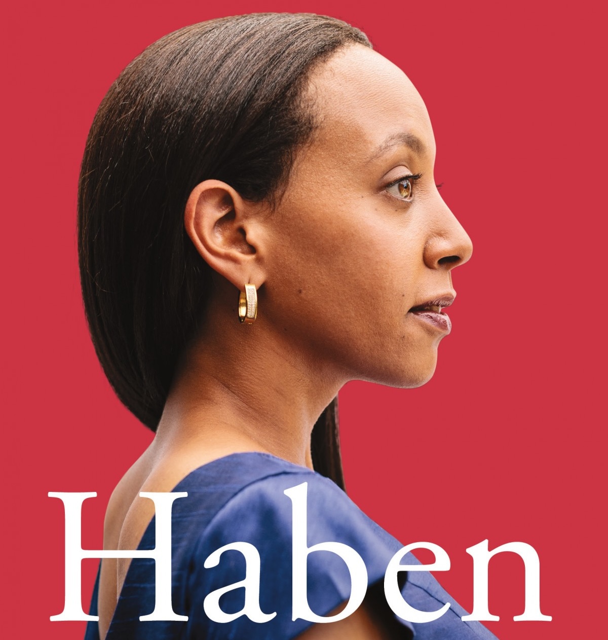 The book cover shows Haben Girma in profile, confidently facing forward in a blue dress. The background is a warm red, and white text over the bottom half of the image says, ‘Haben: The Deafblind Woman Who Conquered Harvard Law. Haben Girma.’